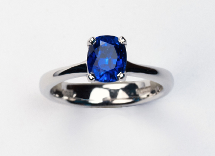 Sapphire four claw ring in platinum
