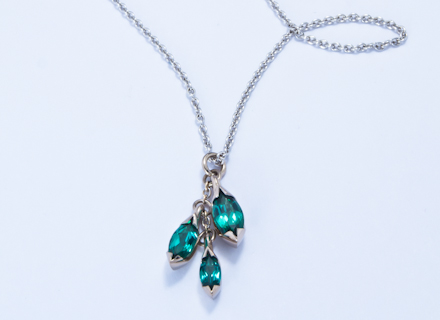 Floral white gold pendant with marquise cut tourmalines