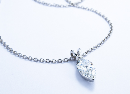 Bunny platinum pendant with a marquise cut diamond