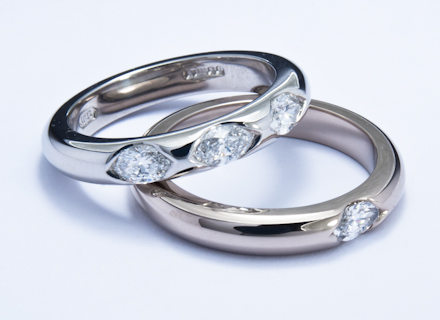 Eternity style white gold and platinum rings end set with marquise cut diamonds