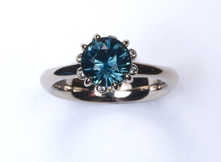 Summer Meadow white gold ring with teal sapphire and diamonds