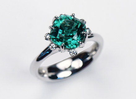 Summer Meadow ring, set with a Lagoon green tourmaline
