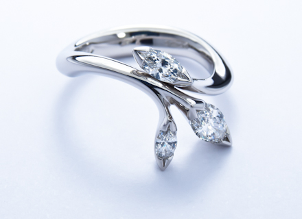 Floral platinum ring with marquise cut diamonds